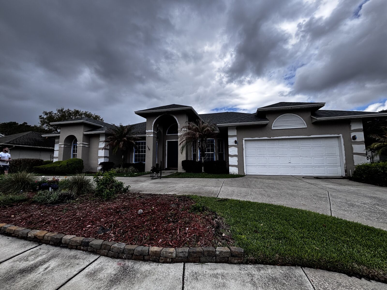 Ranch home white and black exterior